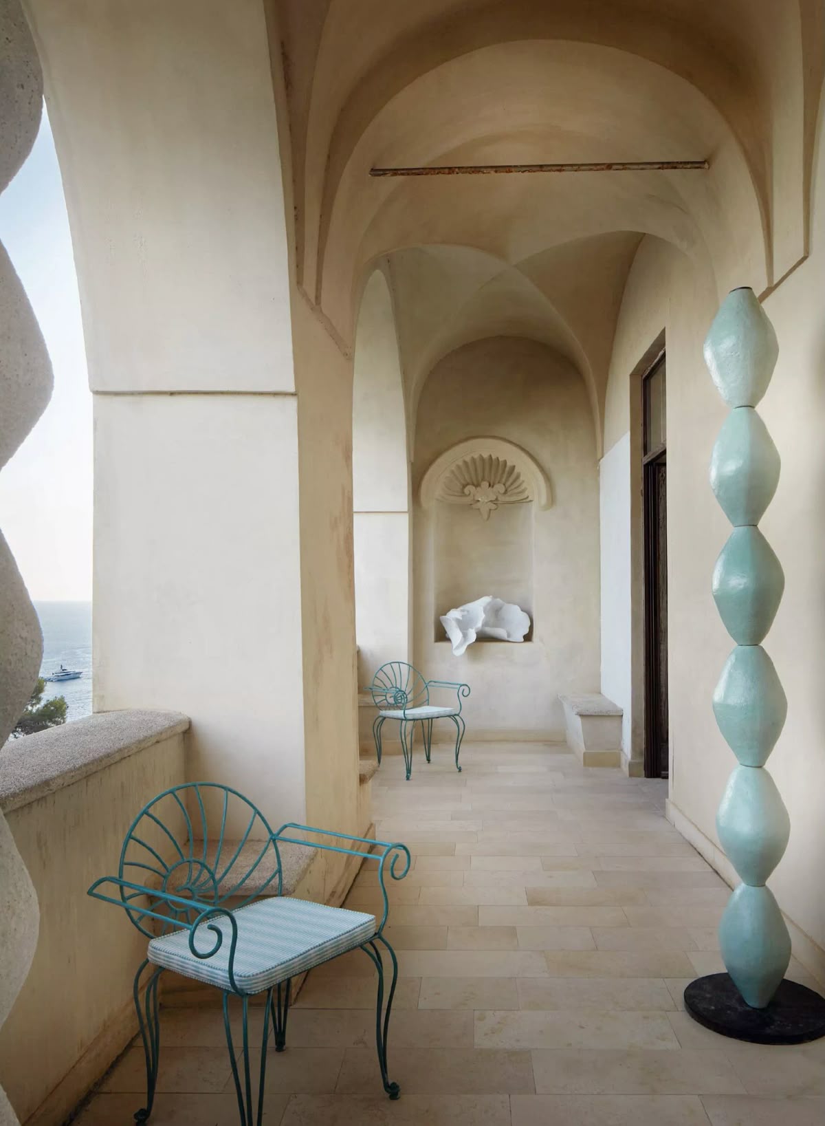 Turquoise sculpture in Mediterranean loggia