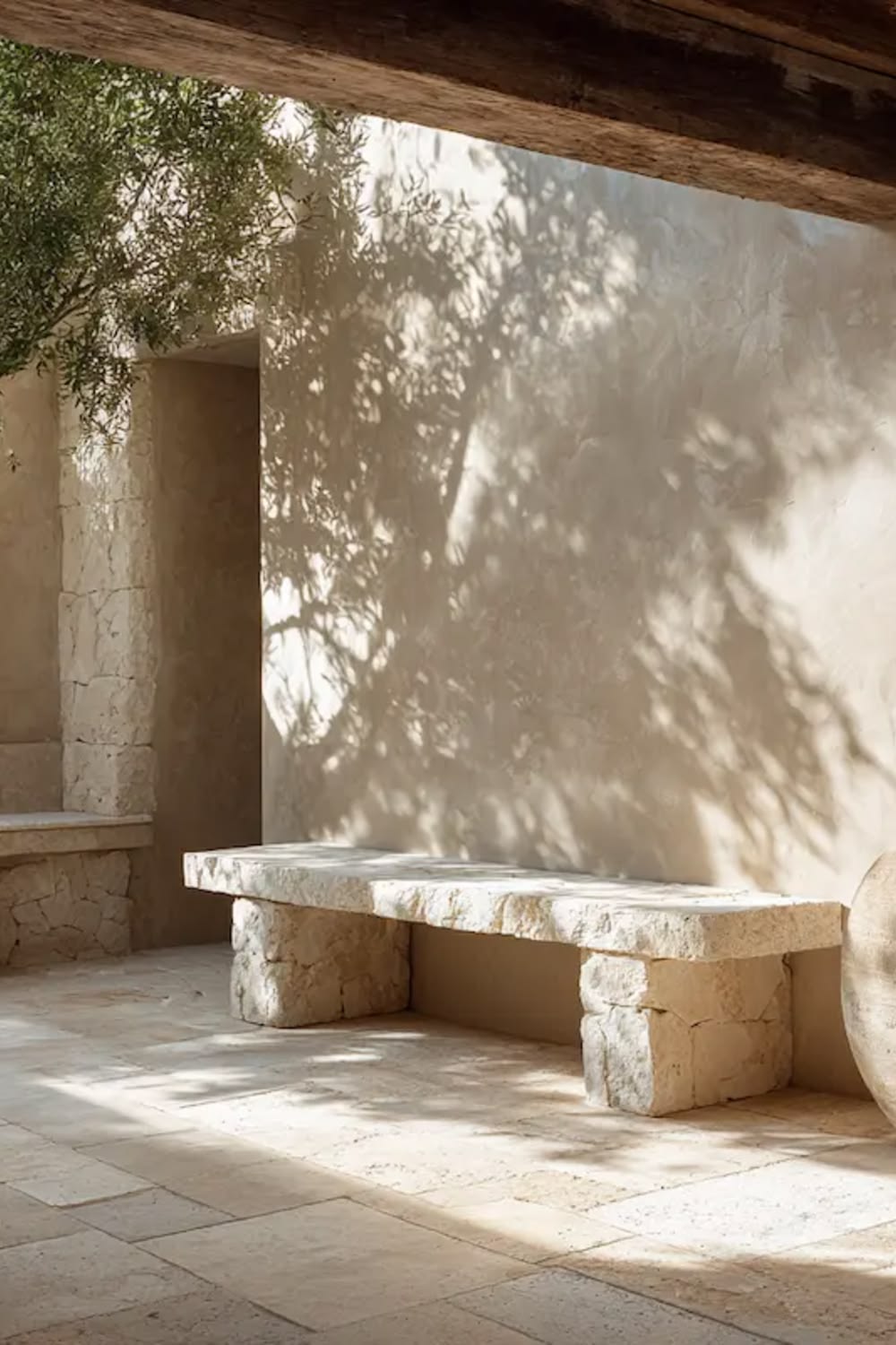 Tosca stone bench under olive tree